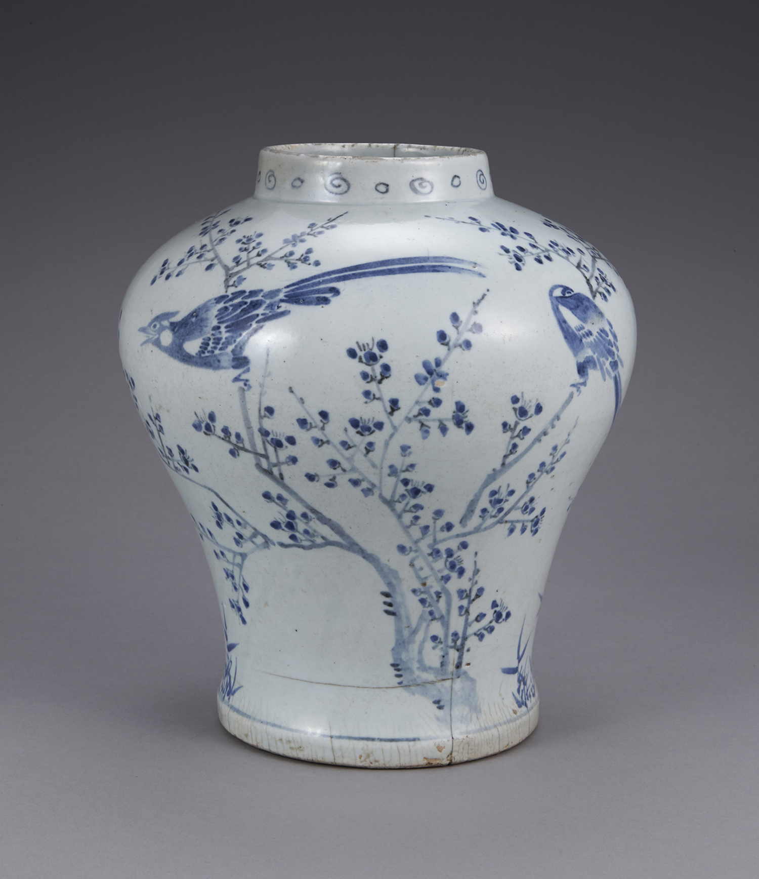 Jar with Plum, Bamboo and Bird Design in Underglaze Blue
